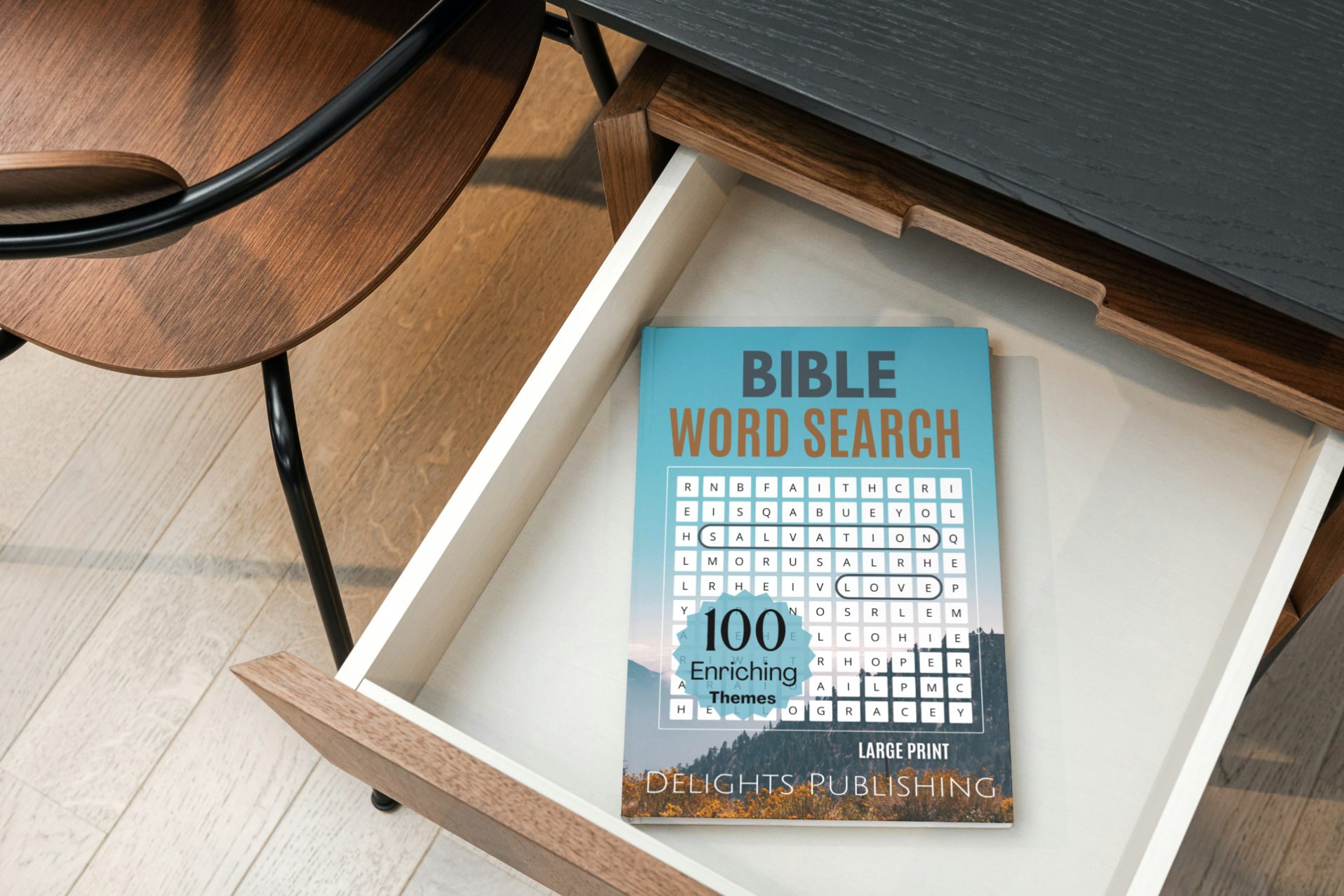 Top view of a bible word search book in an open desk draw.