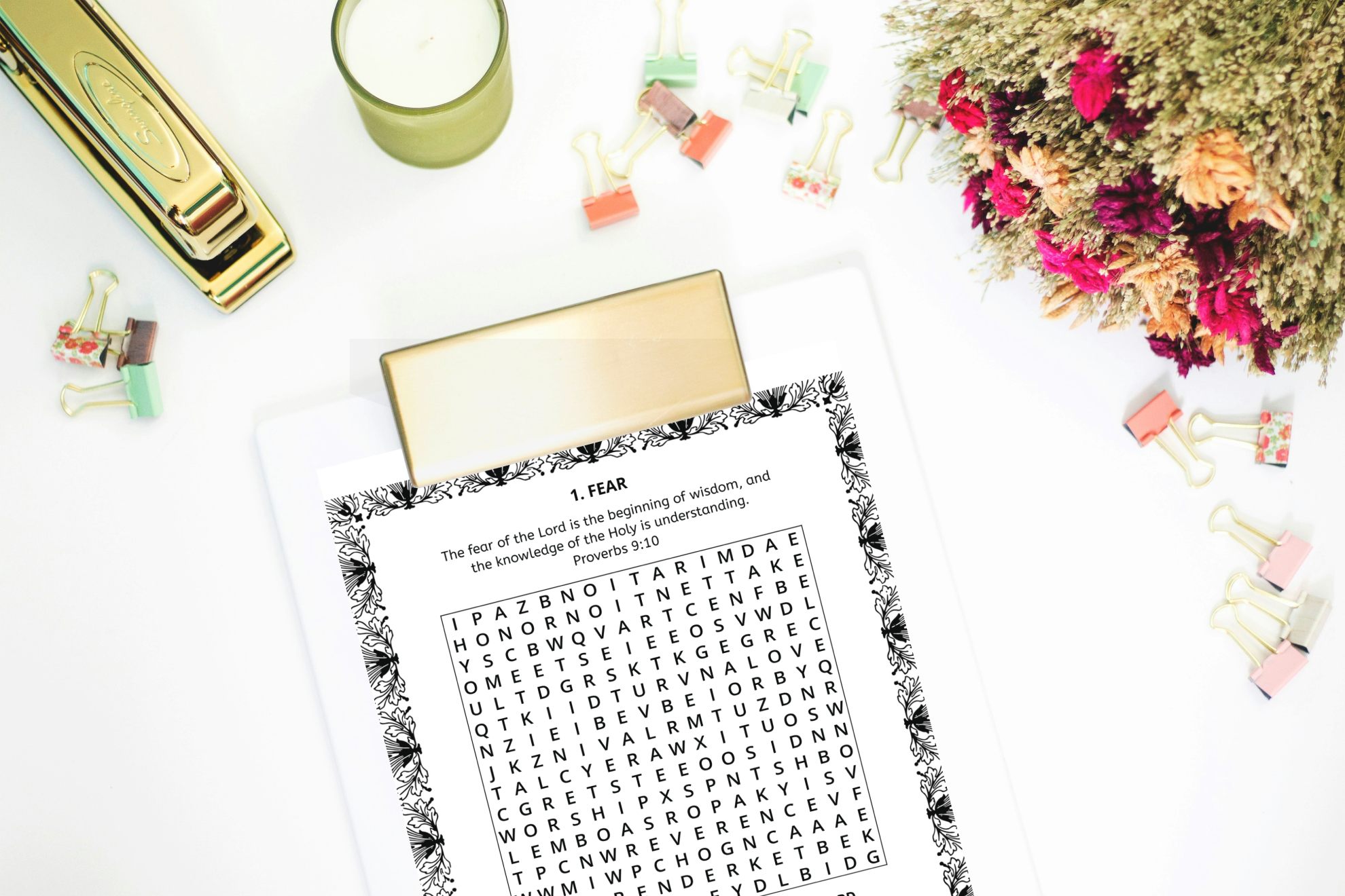 free bible word search printable attached to a clip board.